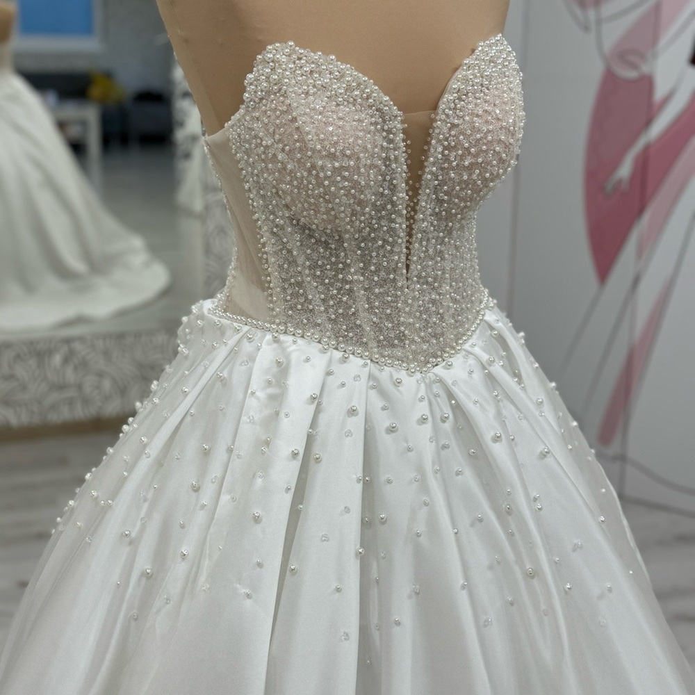 Elegant White Pearl-Embellished Gown